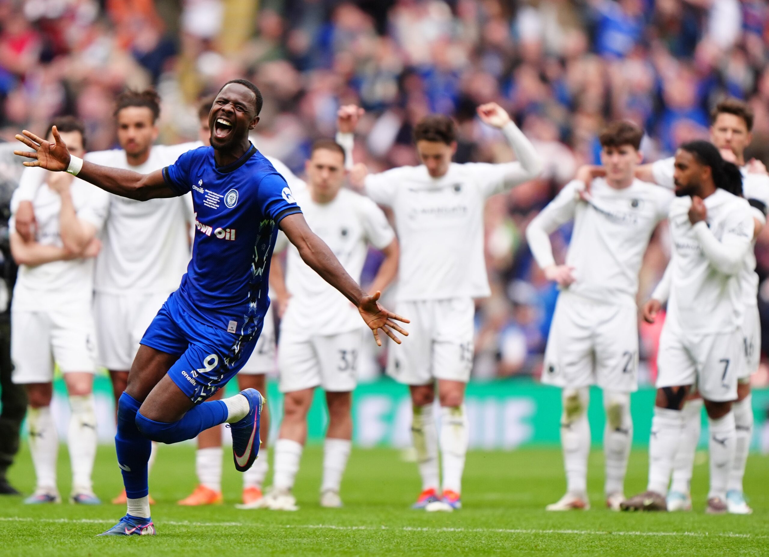 Rochdale secure Football League return in dramatic fashion