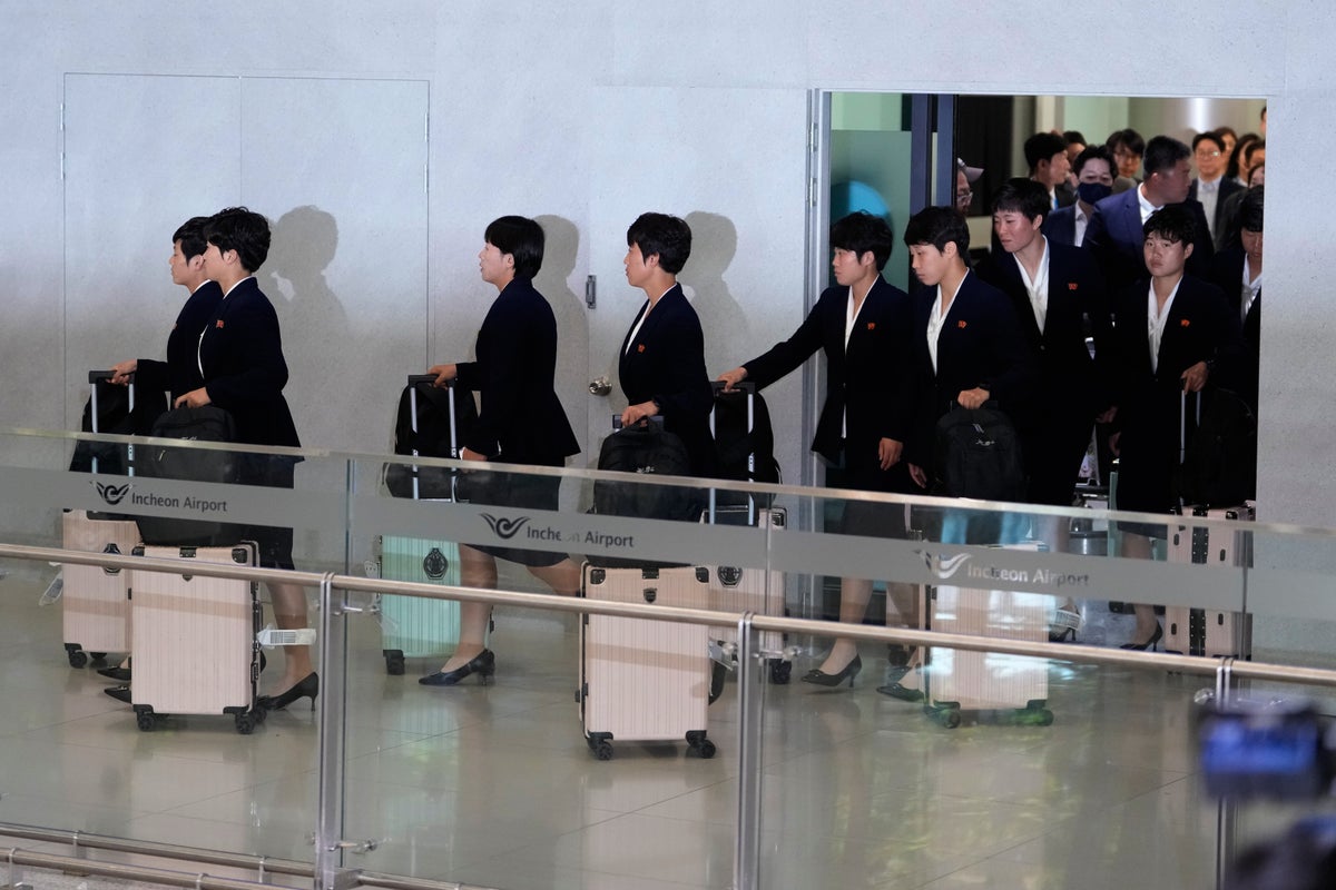 North Korean footballers arrive in South in rare glimpse at citizens of secretive country