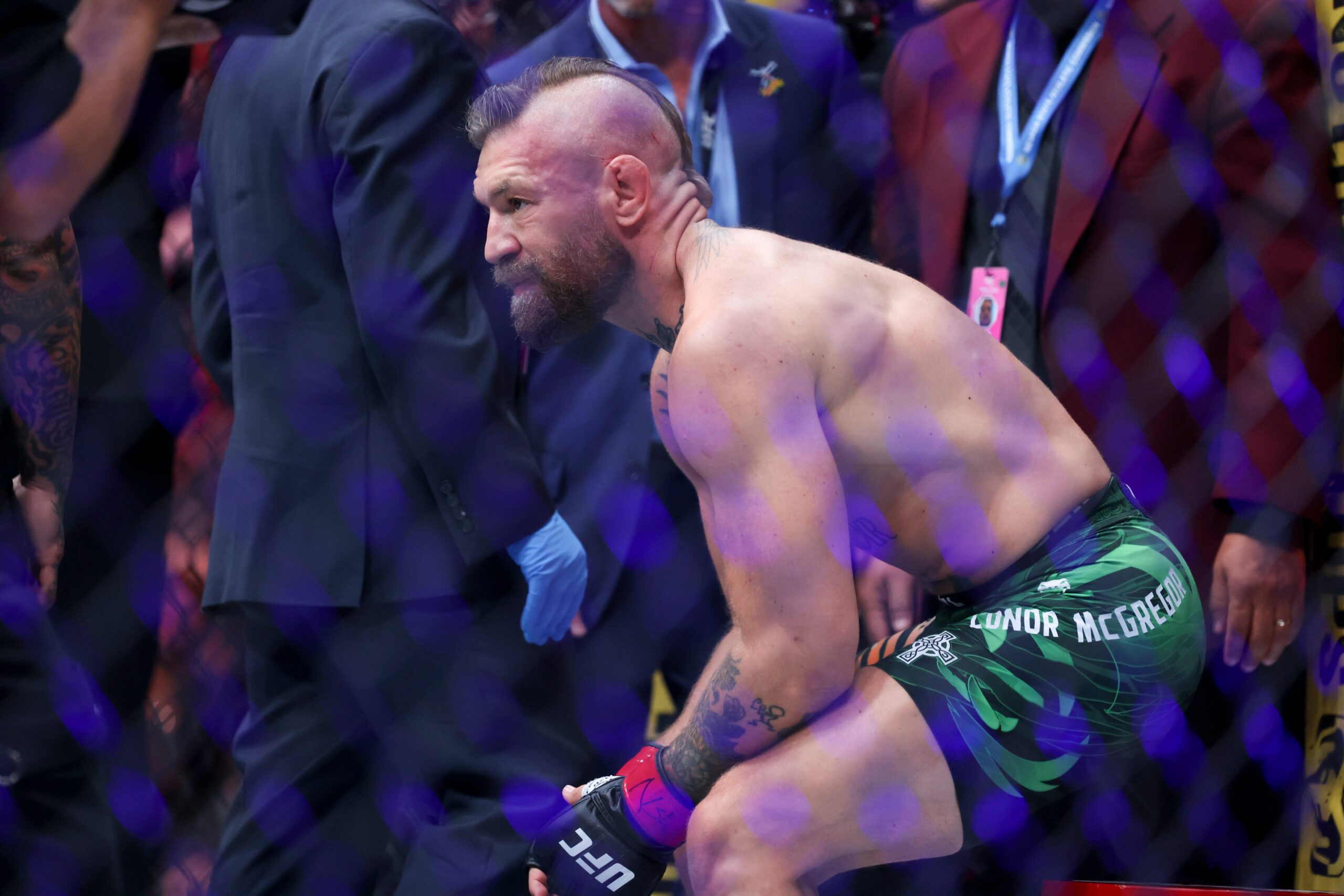 Conor McGregor after suffering an injury in his rematch with Max Holloway